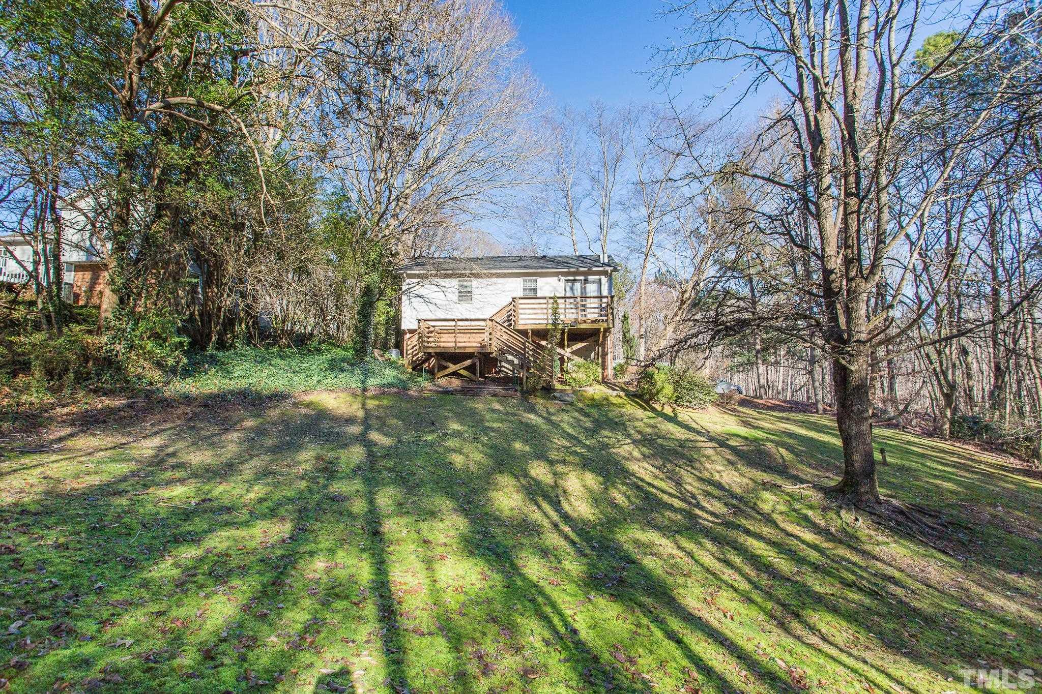 501 Sawmill Road Raleigh, NC 27615 - Photo 31 of 31 a view of outdoor space with deck and a backyard