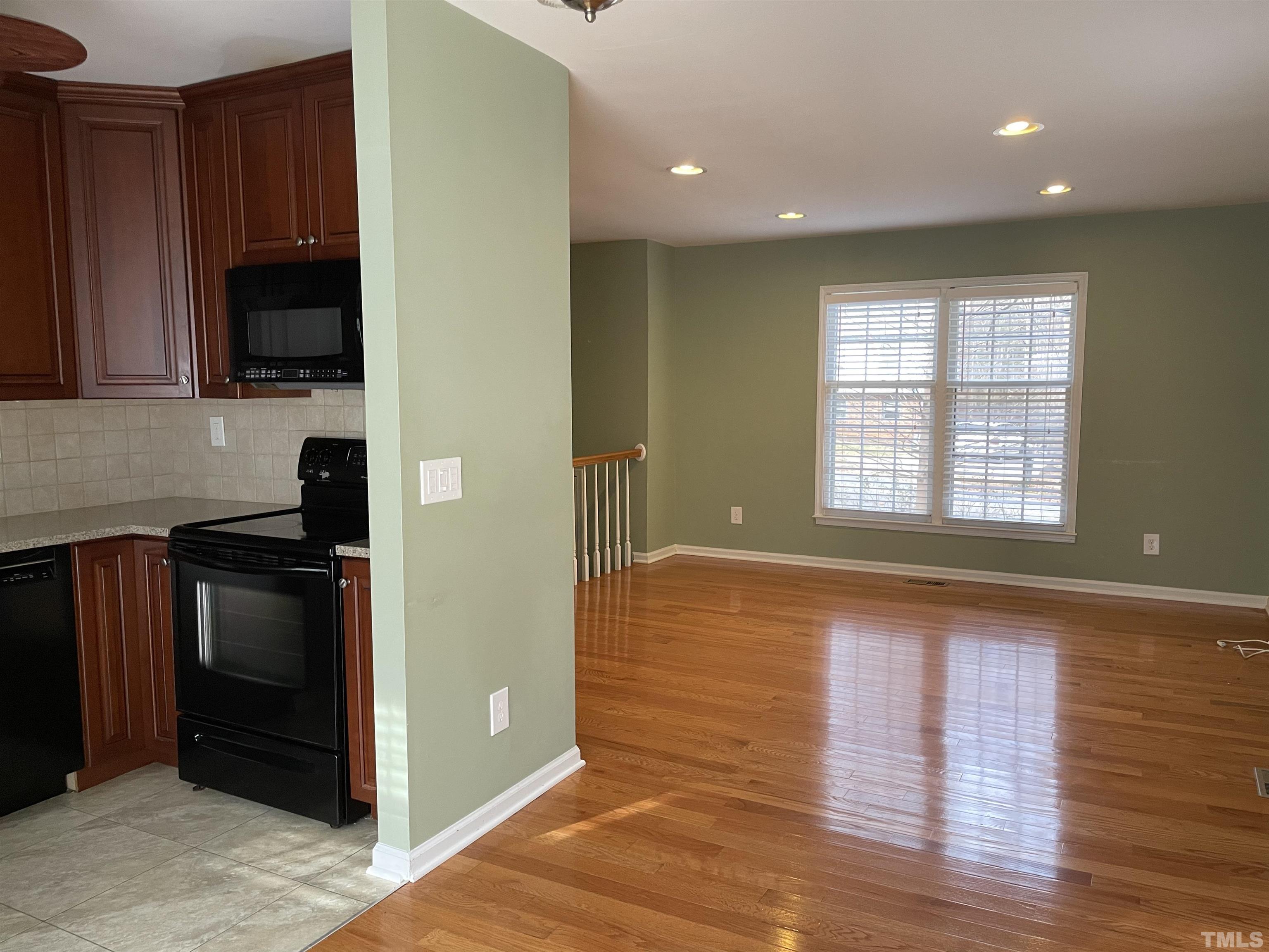 501 Sawmill Road Raleigh, NC 27615 - Photo 5 of 31 a view of a kitchen from the hallway