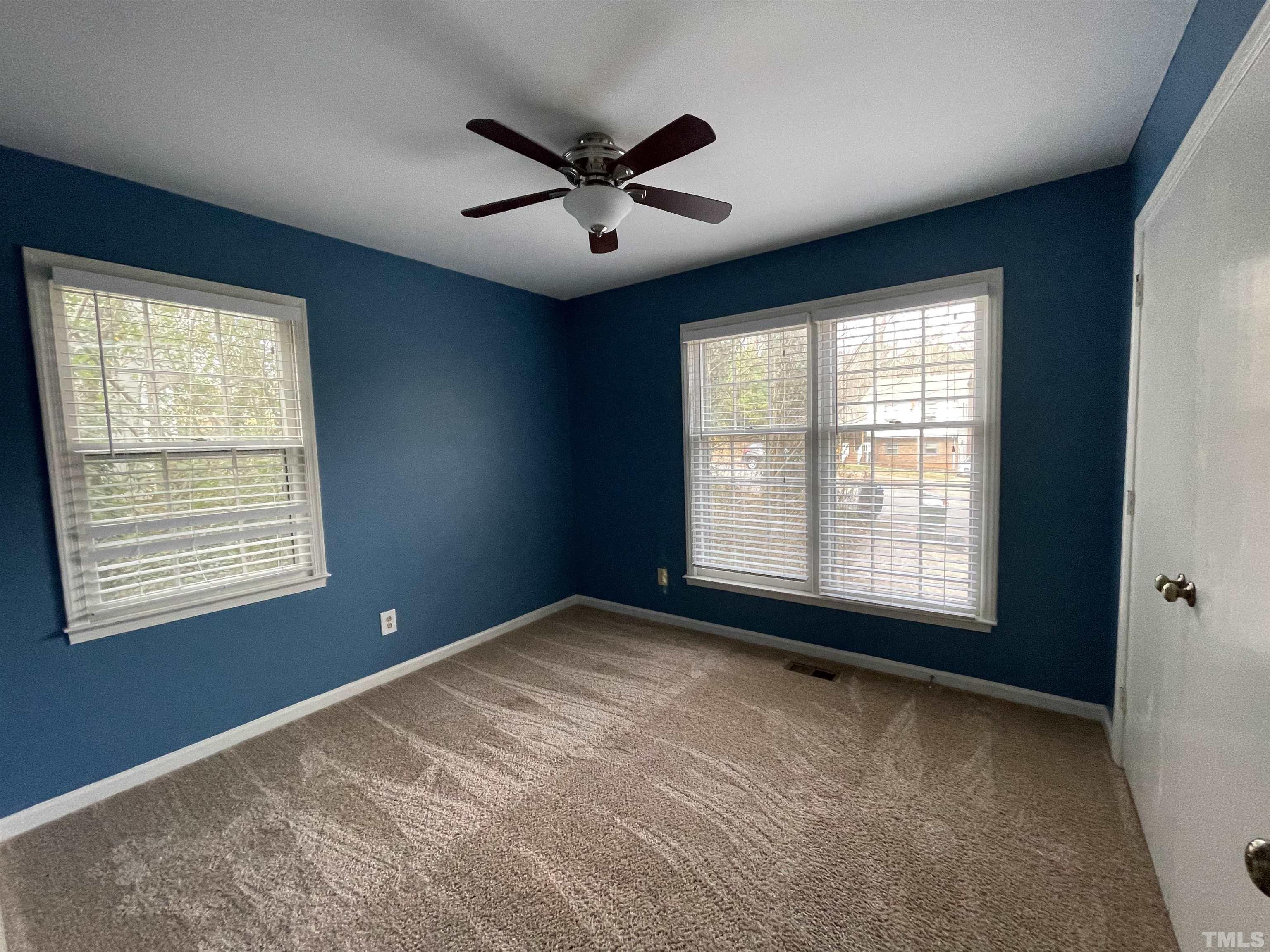 501 Sawmill Road Raleigh, NC 27615 - Photo 9 of 31 a view of an empty room with a window