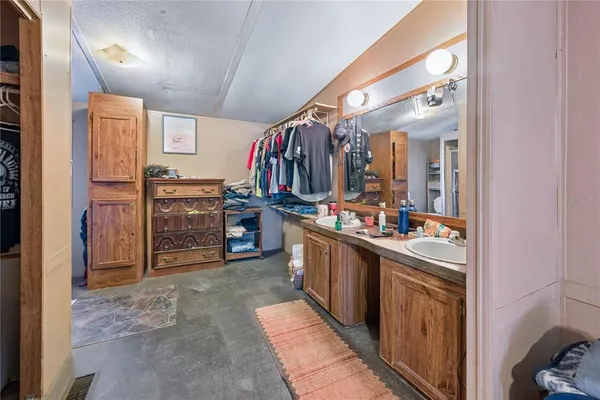 a view of a kitchen with appliances and cabinets