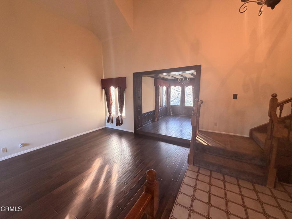 2621 Bitternut Circle Simi Valley, CA 93065 - Photo 13 of 20 a view of a livingroom with wooden floor and an entrance