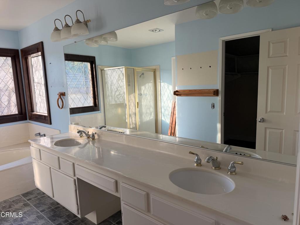 2621 Bitternut Circle Simi Valley, CA 93065 - Photo 18 of 20 a bathroom with a sink and a mirror
