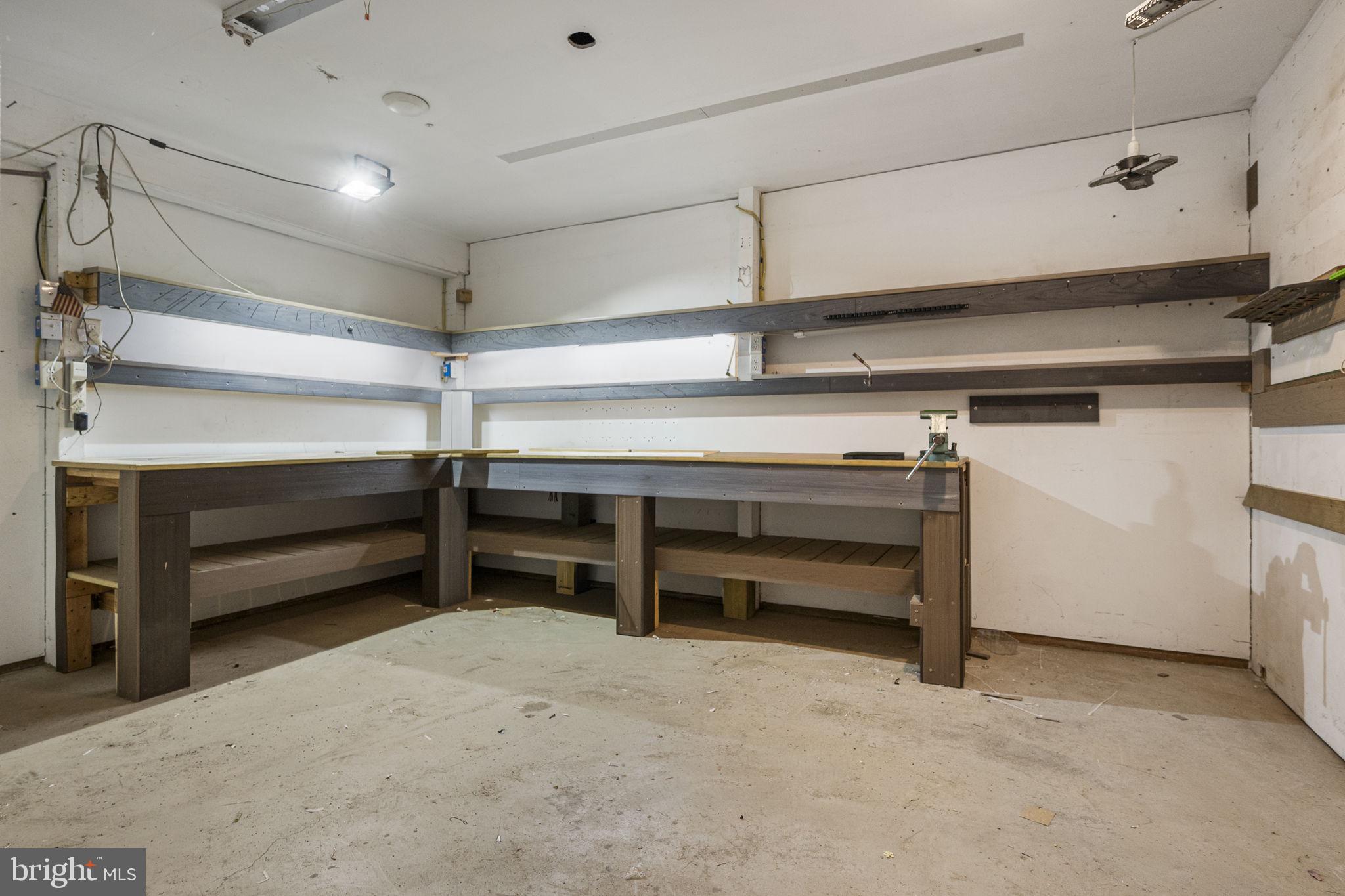 319 Fairview Chapel Road Birdsboro, PA 19508 - Photo 32 of 34 Spacious workshop with ample shelving.