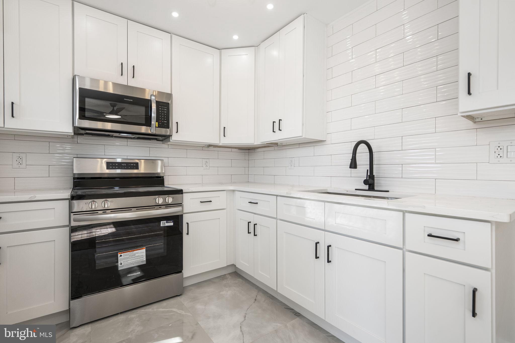319 Fairview Chapel Road Birdsboro, PA 19508 - Photo 7 of 34 Sleek modern kitchen with stylish finishes.