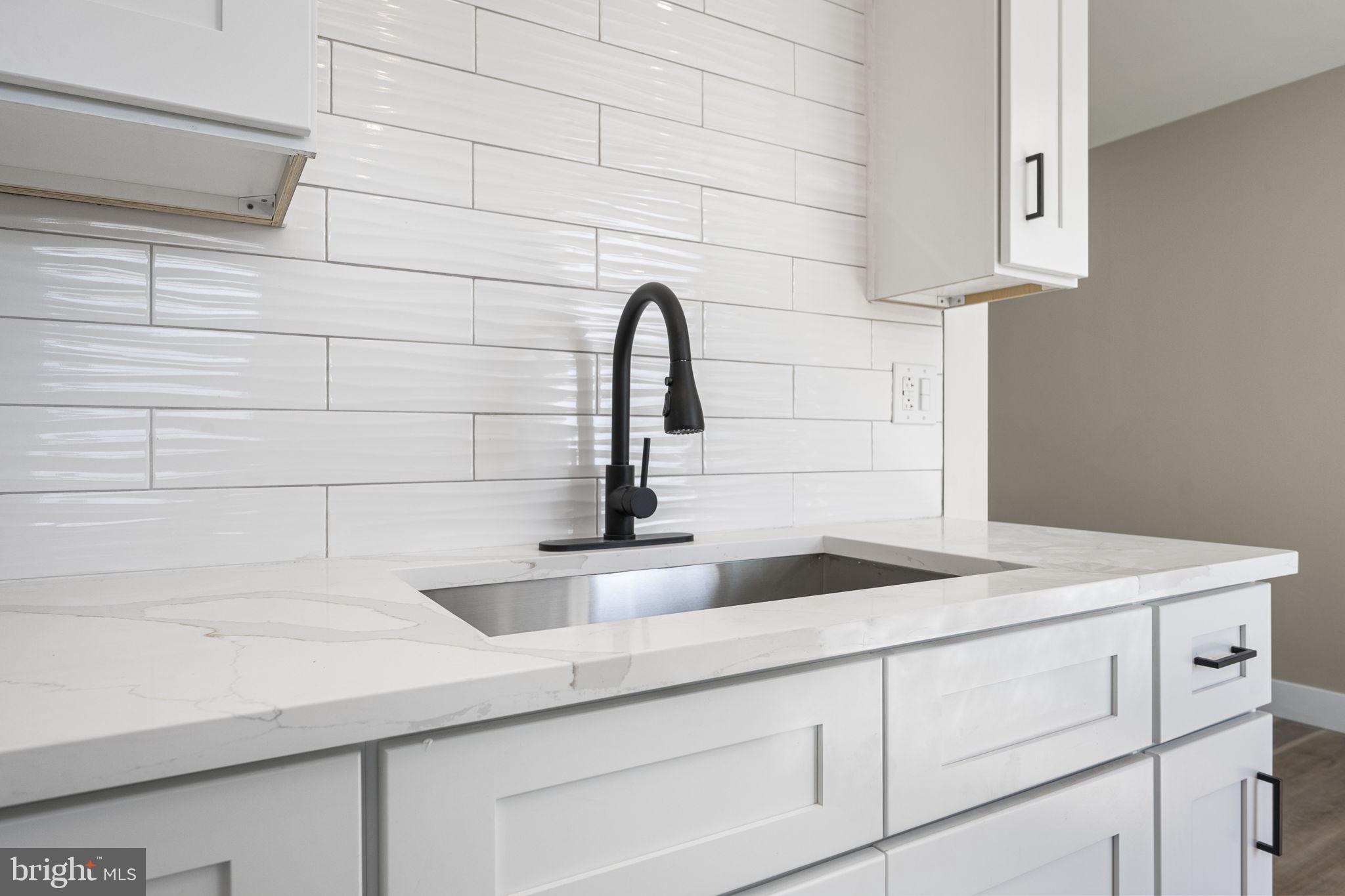 319 Fairview Chapel Road Birdsboro, PA 19508 - Photo 9 of 34 Sleek modern kitchen with elegant finishes.
