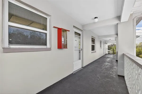 a view of hallway with livingroom