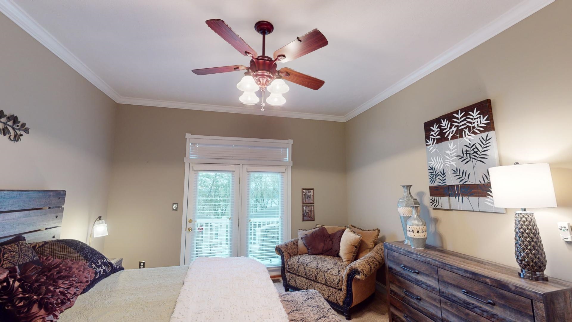 19 Aqua Drive Iuka, MS 38852 - Photo 13 of 33 a bedroom with a bed and wooden floor