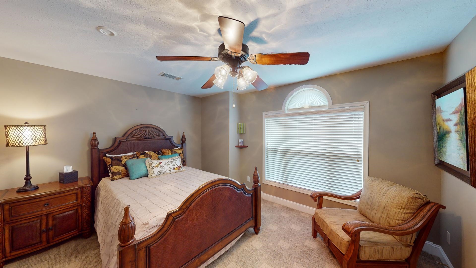 19 Aqua Drive Iuka, MS 38852 - Photo 15 of 33 a bedroom with a bed chair and a window