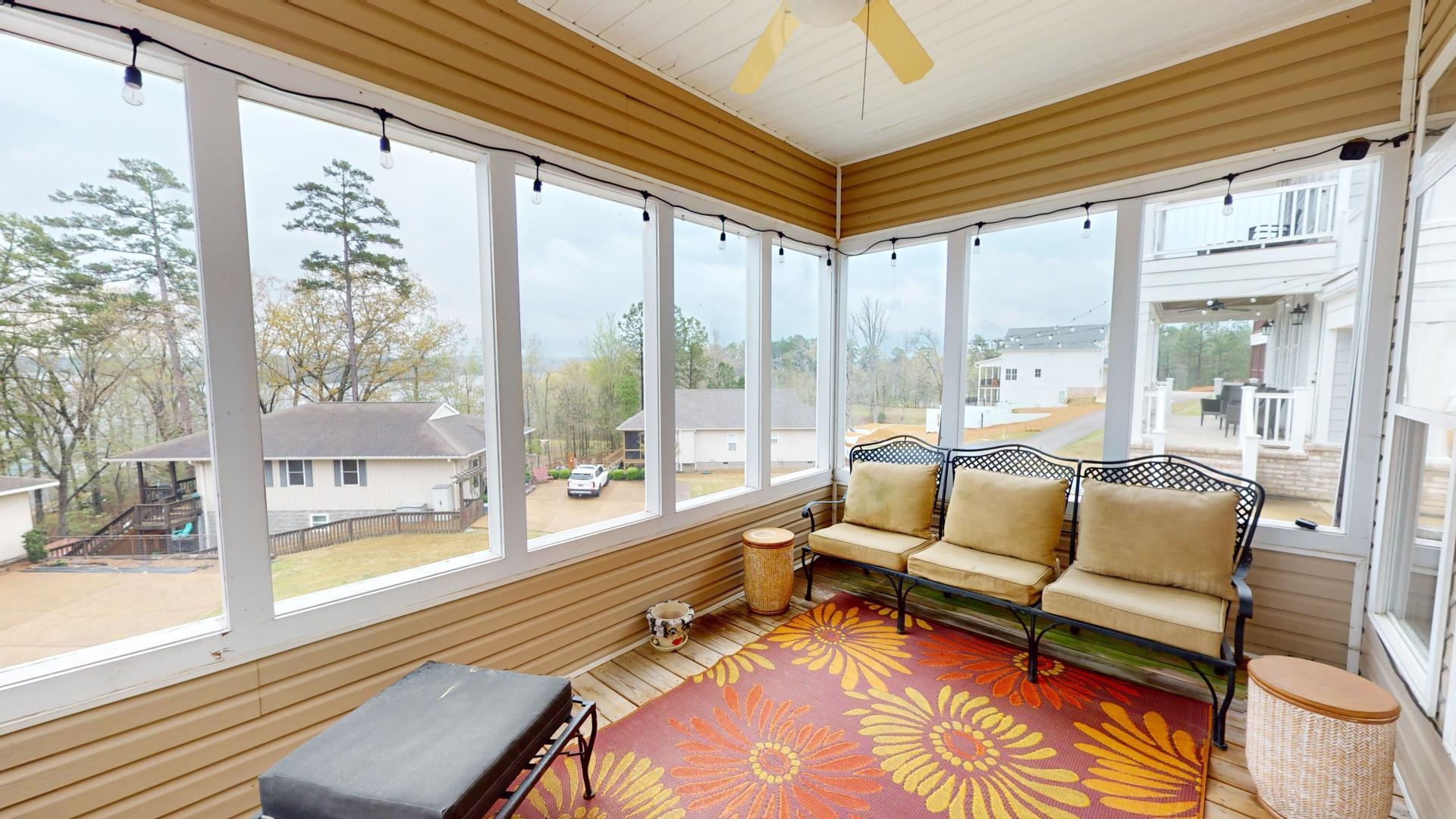 19 Aqua Drive Iuka, MS 38852 - Photo 19 of 33 a living room with furniture and a large window