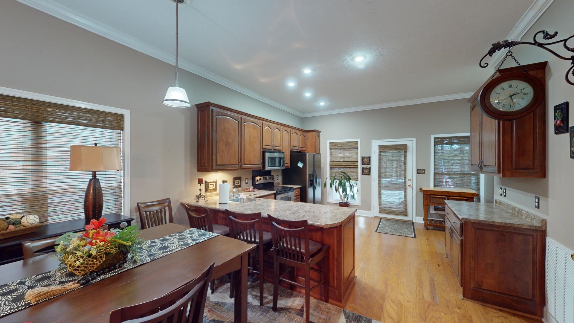 19 Aqua Drive Iuka, MS 38852 - Photo 6 of 33 a view of a dining room with furniture window and wooden floor
