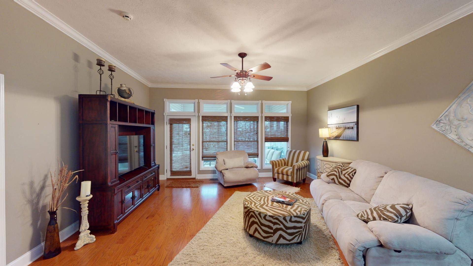 19 Aqua Drive Iuka, MS 38852 - Photo 8 of 33 a spacious bedroom with furniture and a flat screen tv