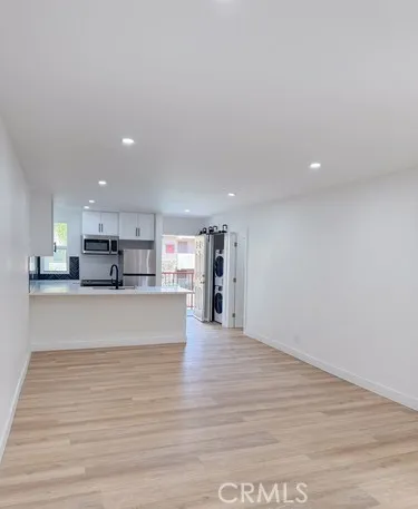 a close view of a faucet a sink and a stove