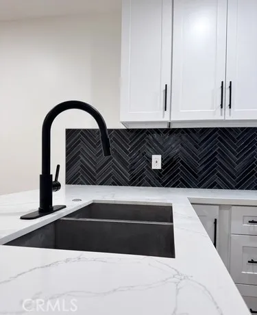 a front view of residential houses with yard and swimming pool