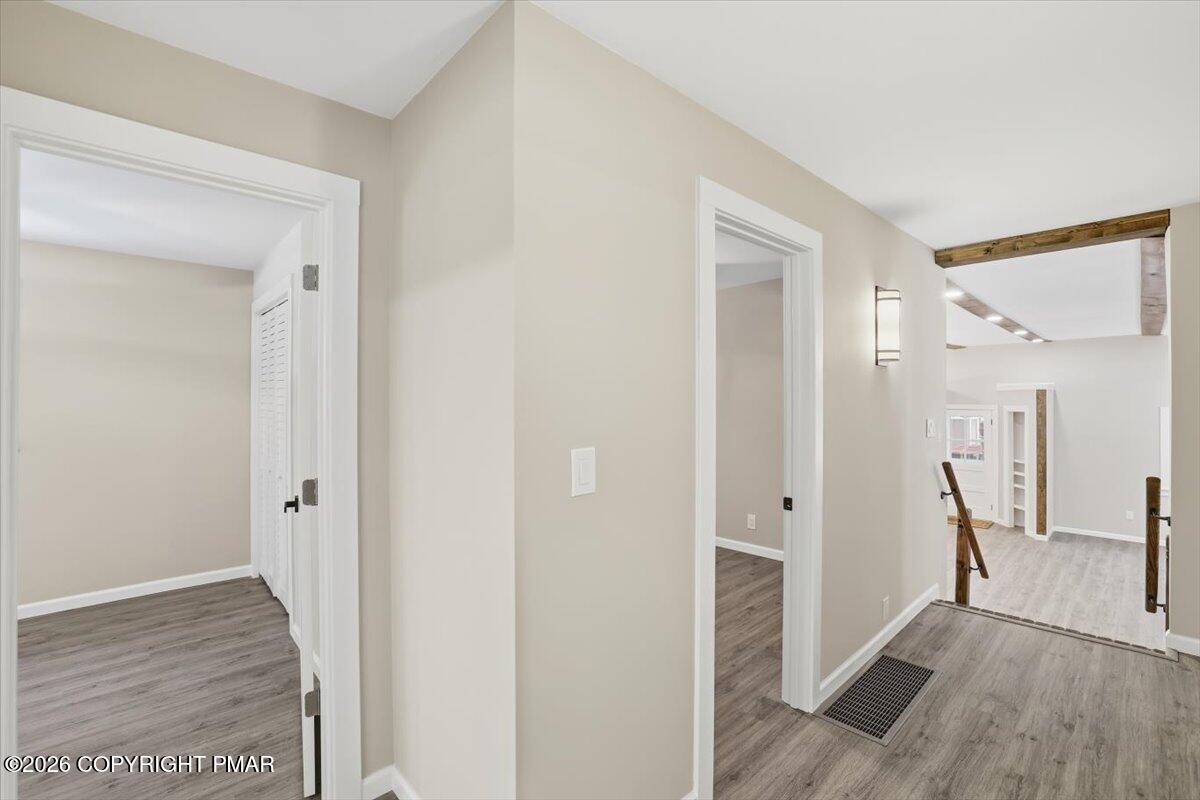 481 Wooddale Road East Stroudsburg, PA 18302 - Photo 14 of 37 a view of a hallway with wooden floor and closet area