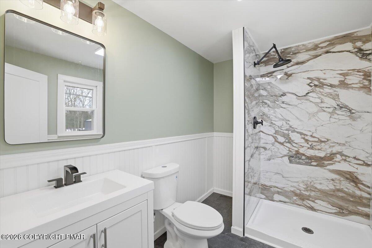 481 Wooddale Road East Stroudsburg, PA 18302 - Photo 18 of 37 a bathroom with a sink toilet and shower