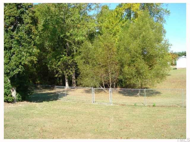 5845 Covered Bridge Road Clayton, NC 27527 - Photo 11 of 11 From your SCREENED-IN porch you can see an overall view of the LARGE and PARTIALLY FENCED-IN back yard of this LOVELY home! Back Yard