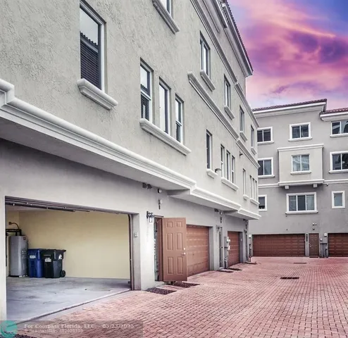 a view of swimming pool from a garden