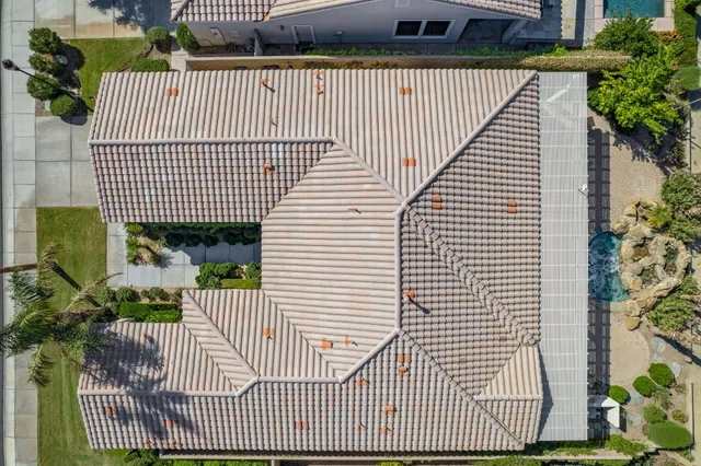 a view of a house with a small yard