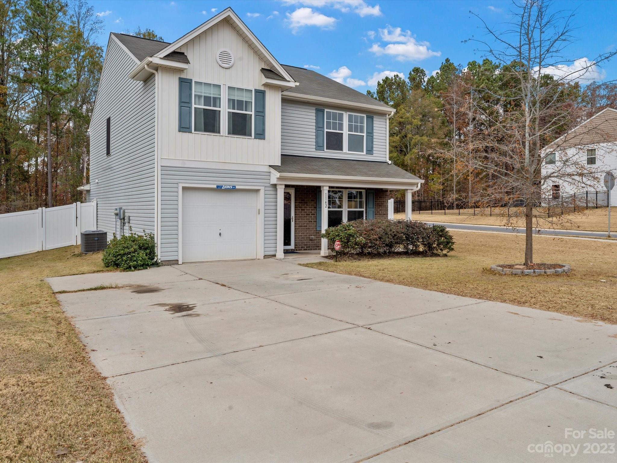 1142 Whitehall Hill Road York, SC 29745 - Photo 1 of 43 a front view of a house with a yard