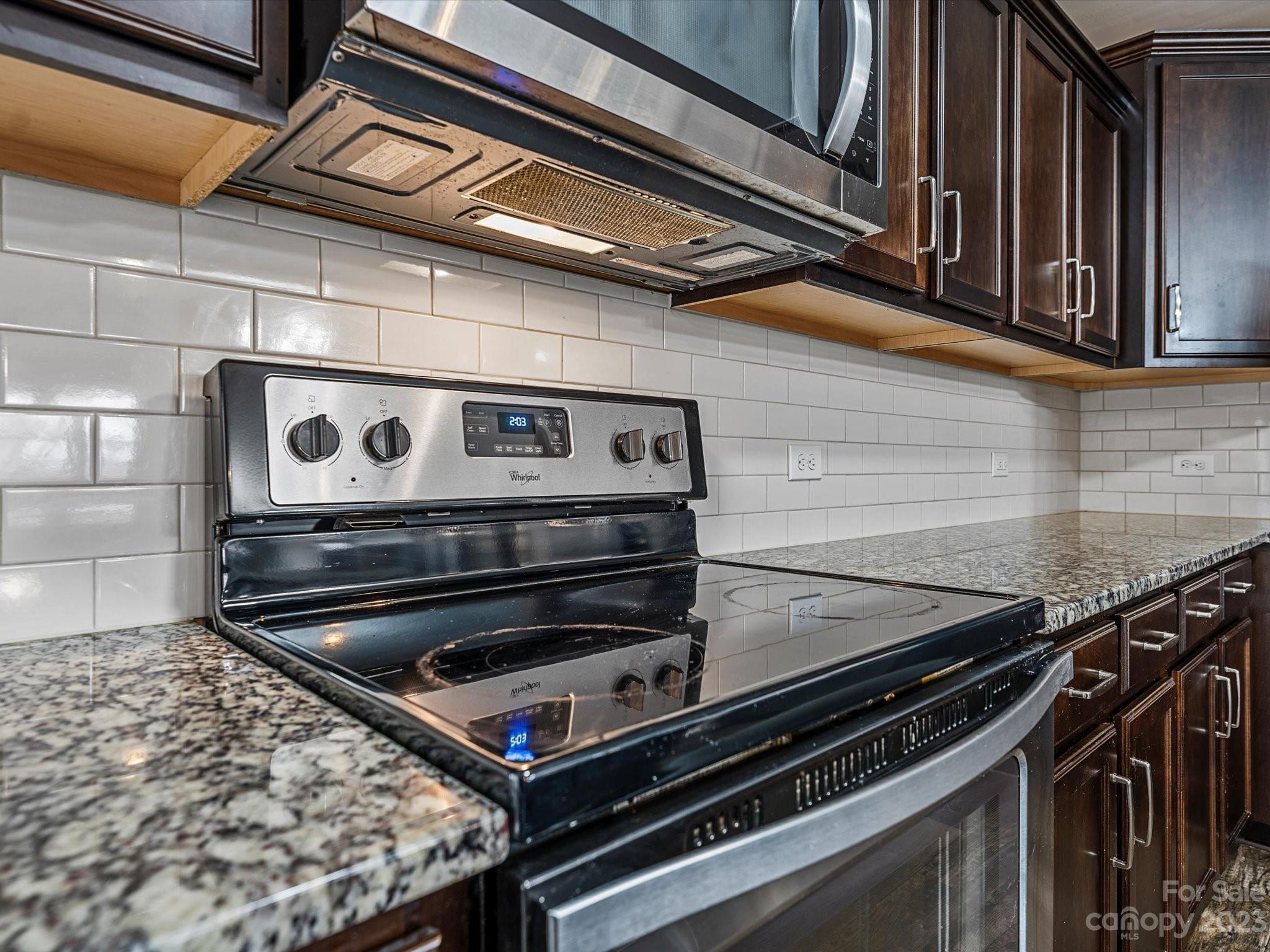 1142 Whitehall Hill Road York, SC 29745 - Photo 18 of 43 a stove top oven sitting inside of a kitchen