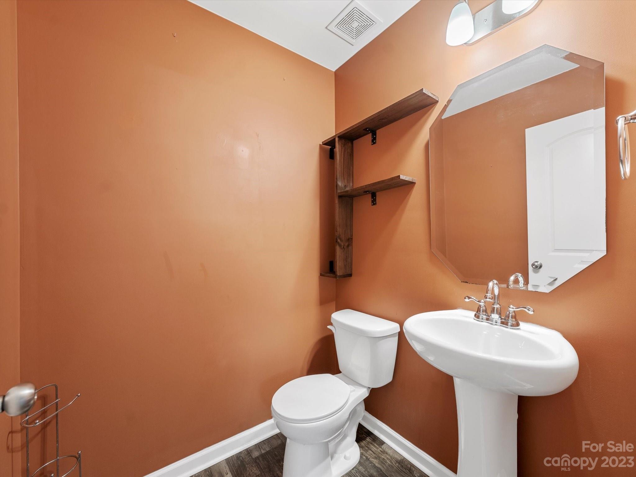 1142 Whitehall Hill Road York, SC 29745 - Photo 19 of 43 a bathroom with a sink and a toilet
