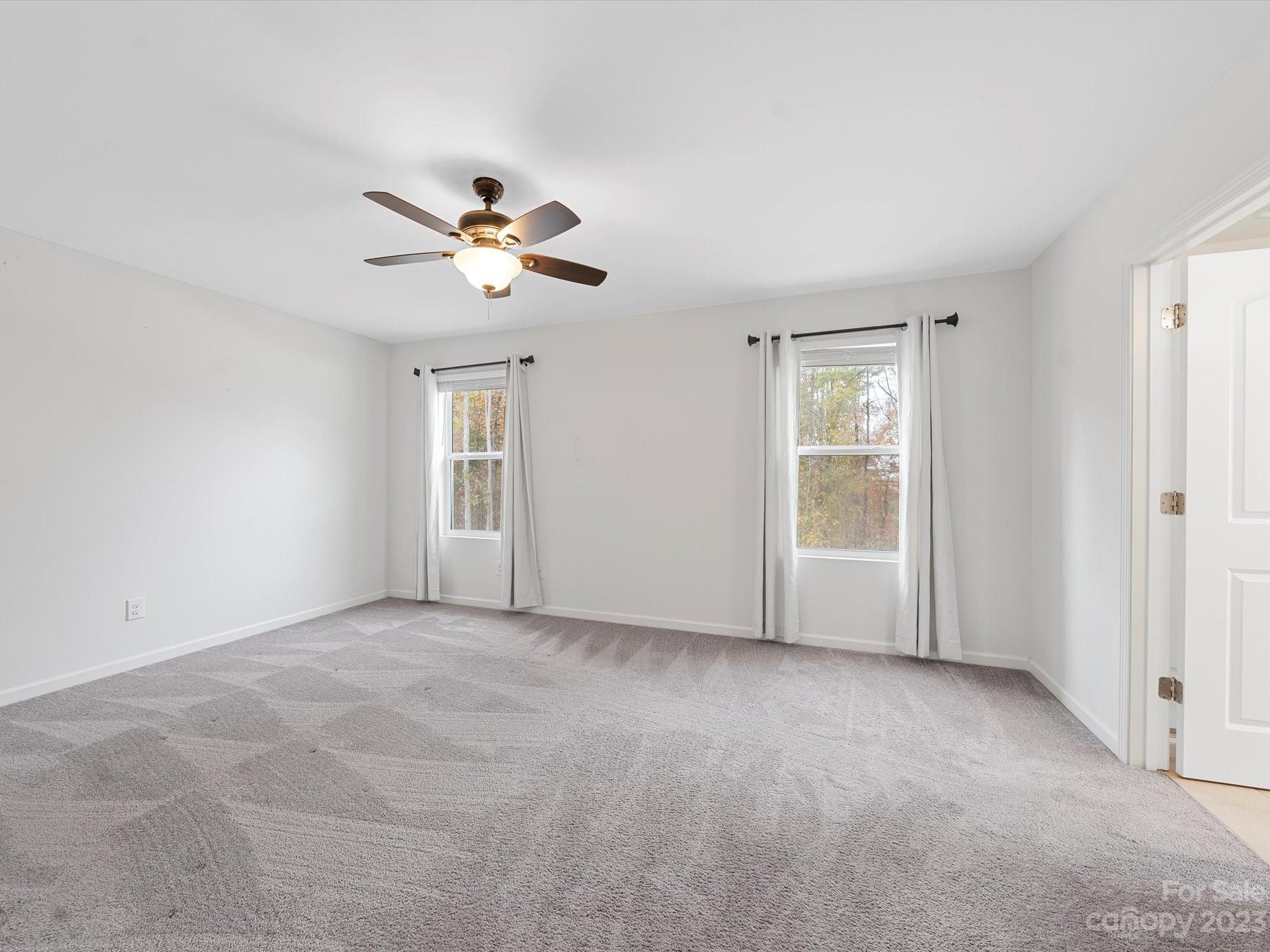 1142 Whitehall Hill Road York, SC 29745 - Photo 22 of 43 wooden floor in an empty room with a window
