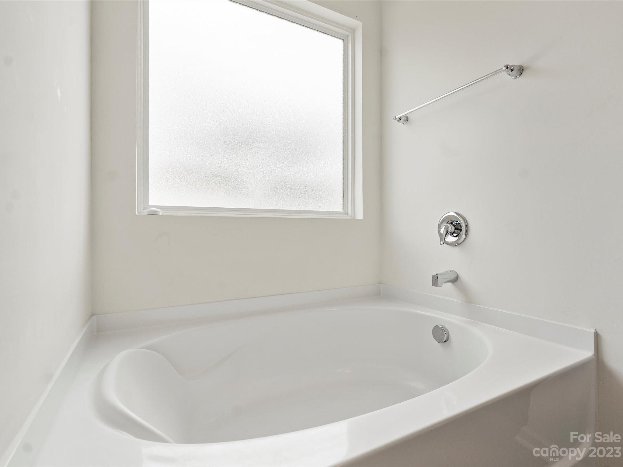 1142 Whitehall Hill Road York, SC 29745 - Photo 27 of 43 a white bath tub sitting next to a window