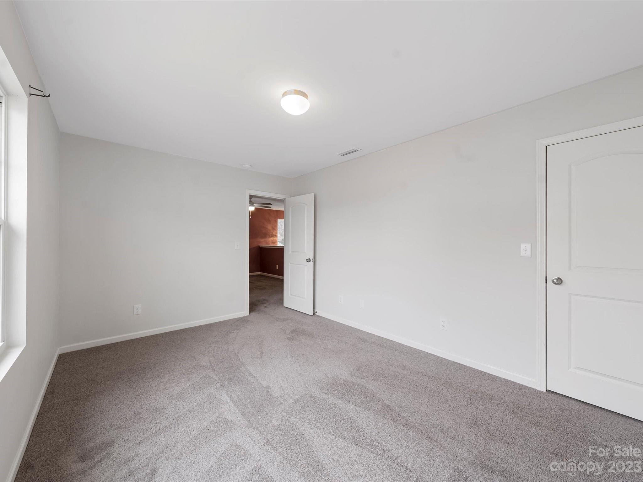 1142 Whitehall Hill Road York, SC 29745 - Photo 30 of 43 a view of an empty room and a window