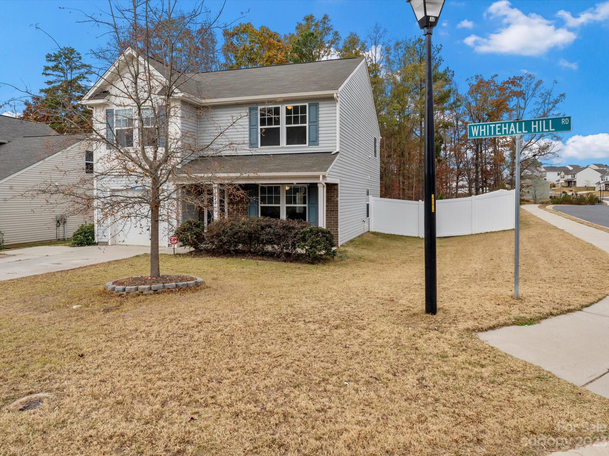 1142 Whitehall Hill Road York, SC 29745 - Photo 3 of 43 a backyard of a house with lots of green space