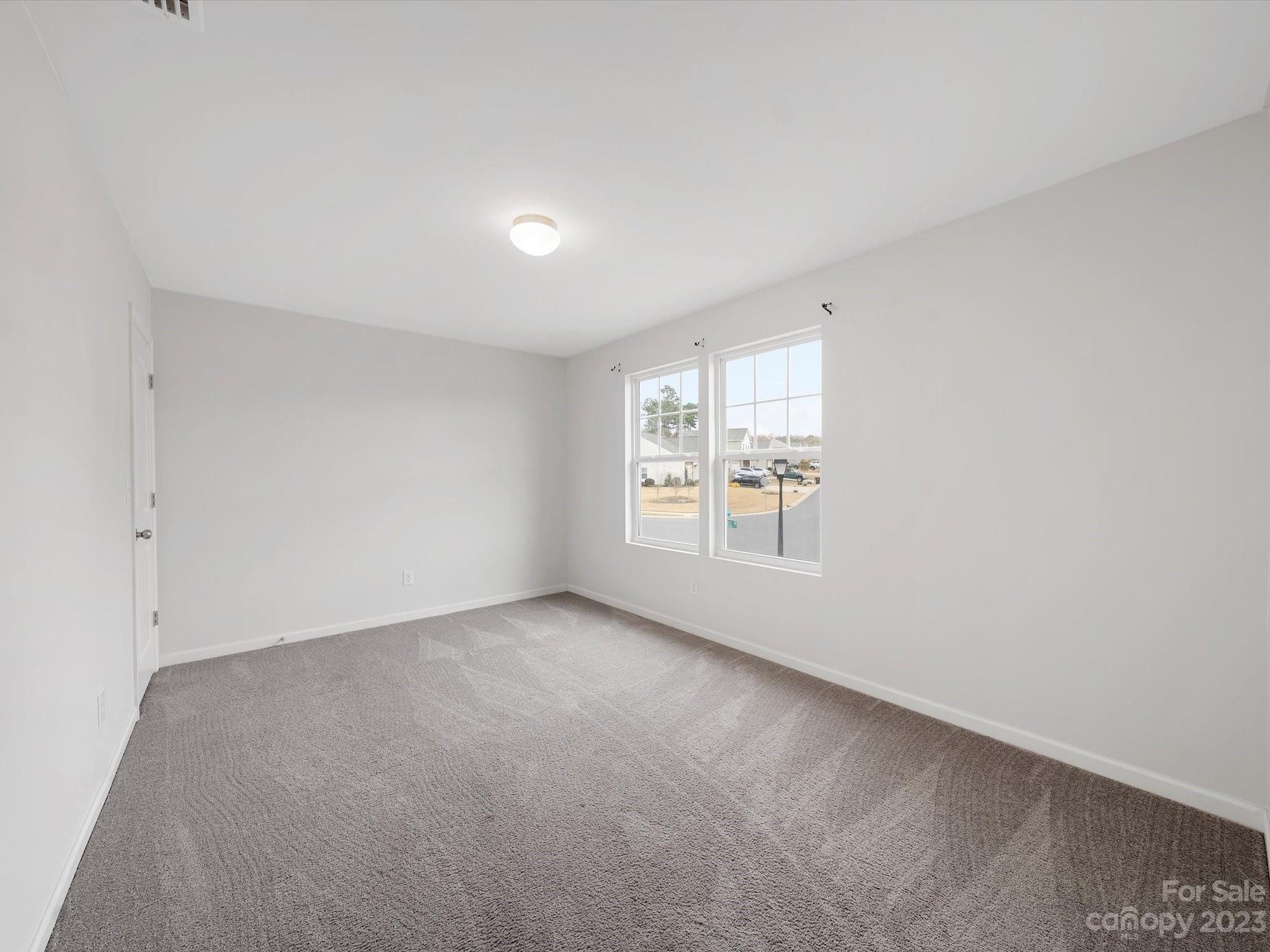 1142 Whitehall Hill Road York, SC 29745 - Photo 31 of 43 a view of an empty room with a window