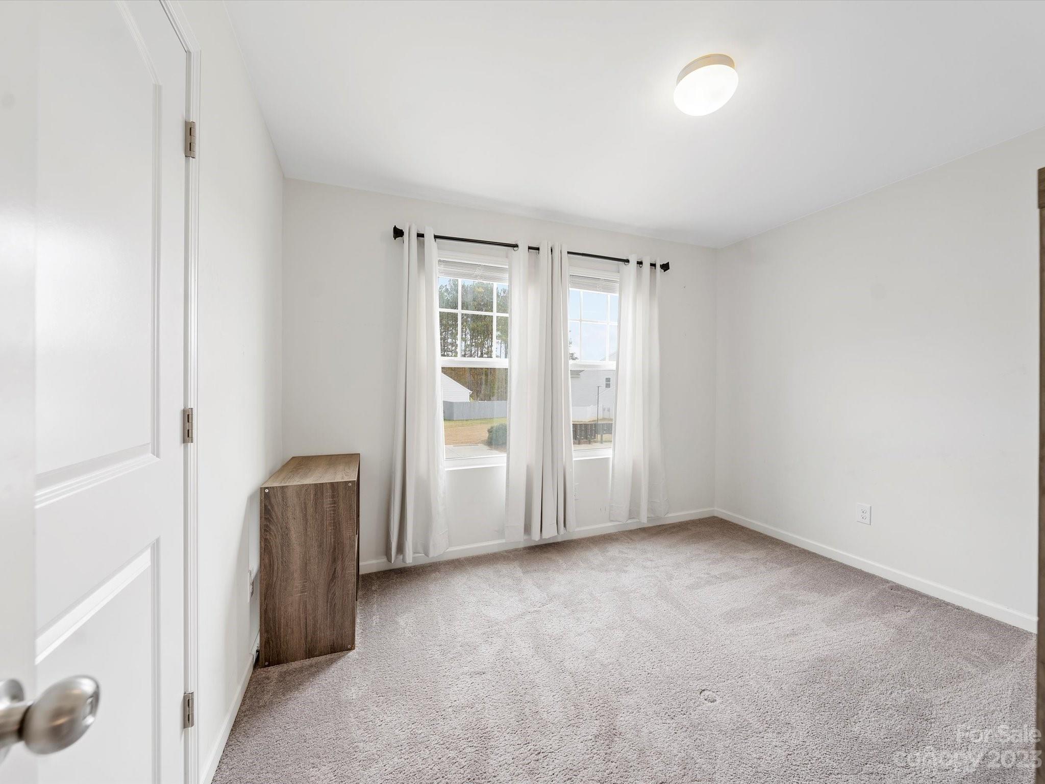 1142 Whitehall Hill Road York, SC 29745 - Photo 34 of 43 an empty room with windows