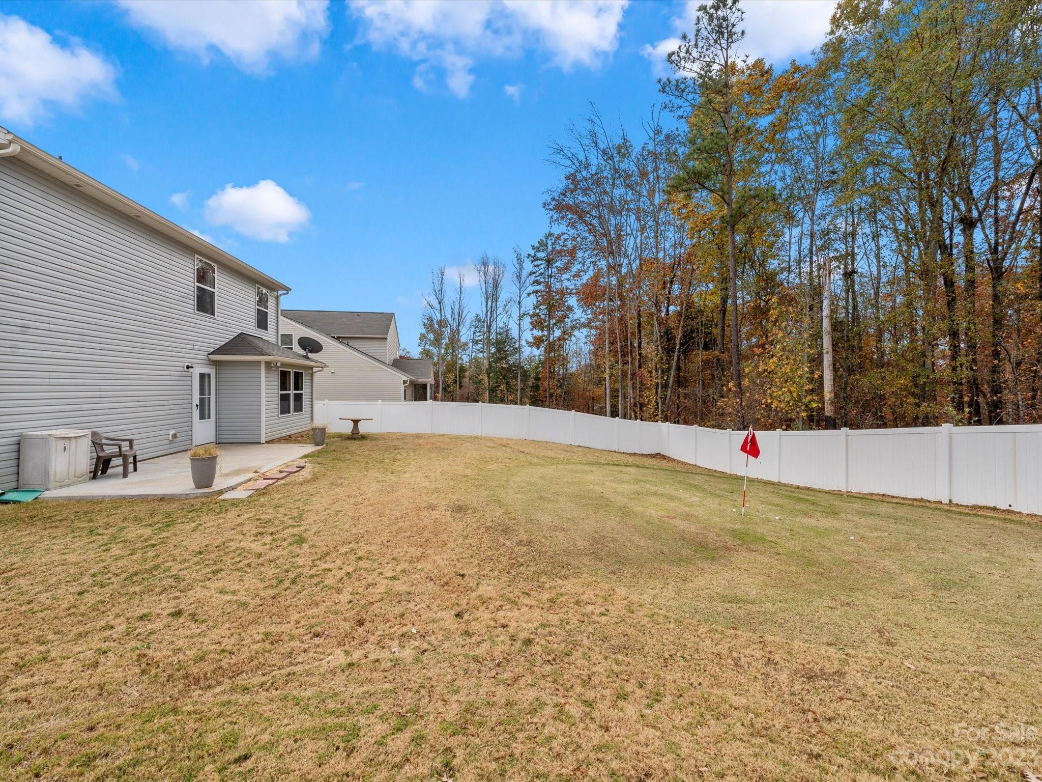 1142 Whitehall Hill Road York, SC 29745 - Photo 38 of 43 a bathroom with a tub and trees in the background