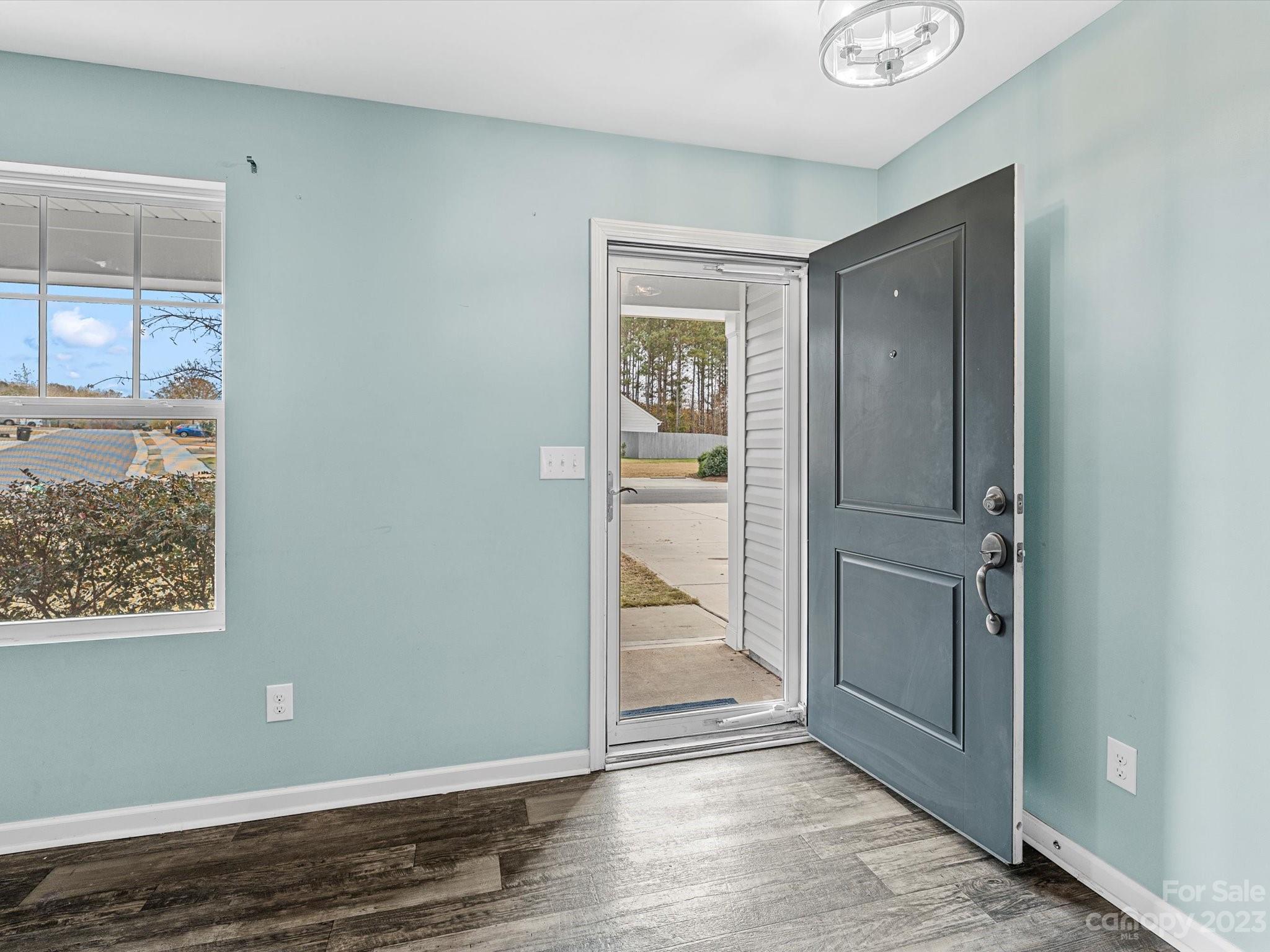 1142 Whitehall Hill Road York, SC 29745 - Photo 6 of 43 an empty room with wooden floor closet and windows