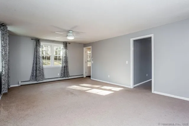 an empty room with windows