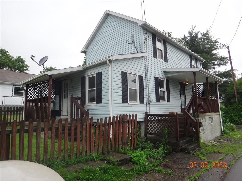 110 Walton Avenue Butler, PA 16001 - Photo 1 of 24 a view of a house with wooden fence
