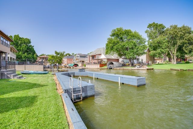 3362 Desert Inn Drive Montgomery, TX 77356 - Photo 45 of 50 a view of a swimming pool with lawn chairs and plants