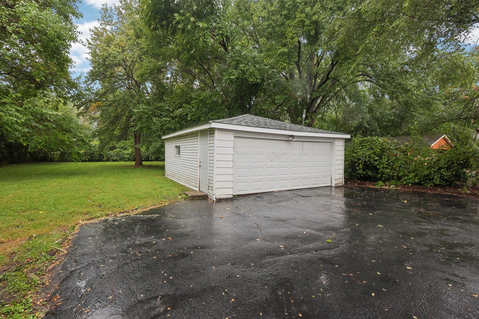 15364 Afton Avenue Markham, IL 60428 - Photo 19 of 23 a view of a backyard with large trees