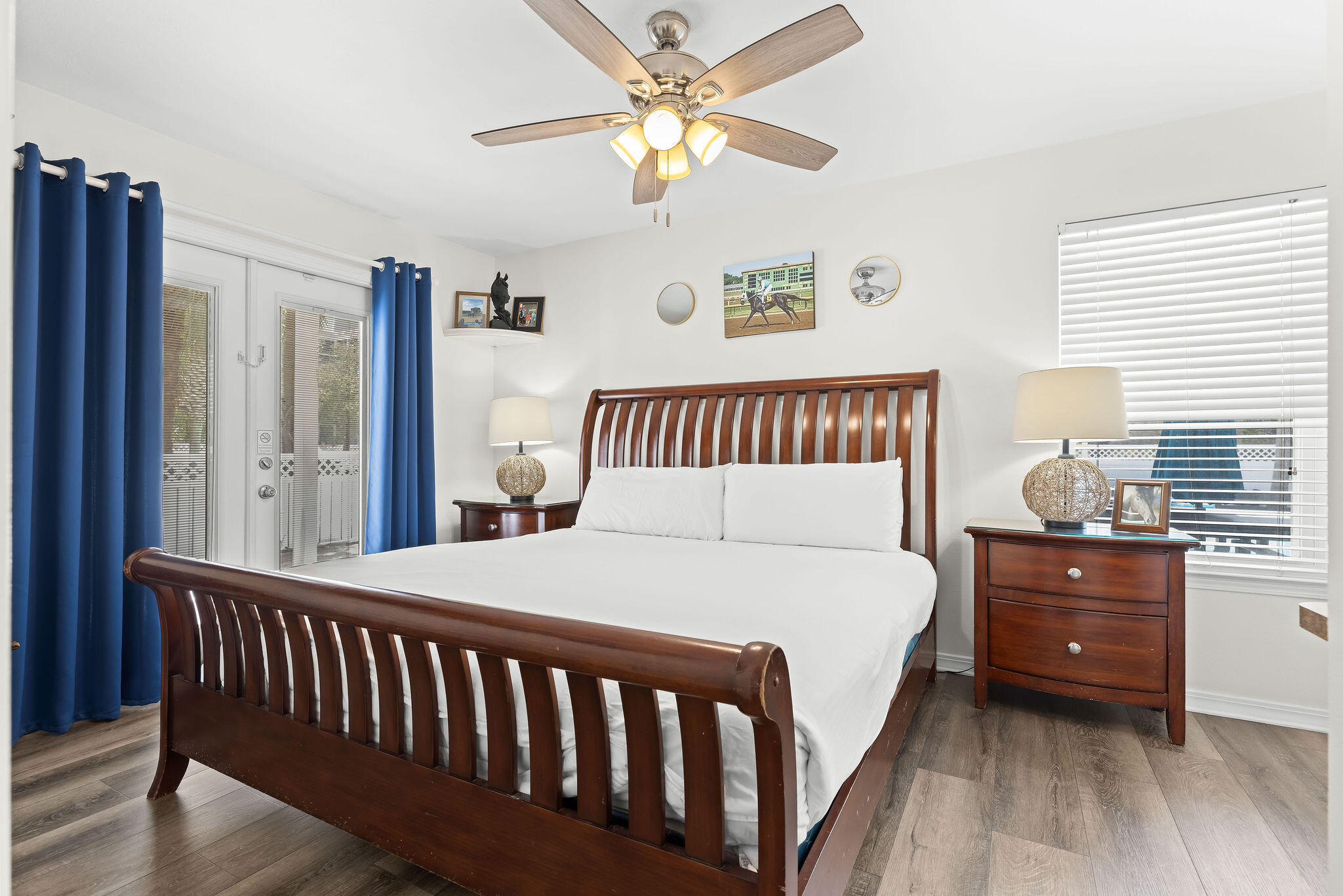 91 Matthew Boulevard Destin, FL 32541 - Photo 36 of 85 a bedroom with a bed and a chandelier