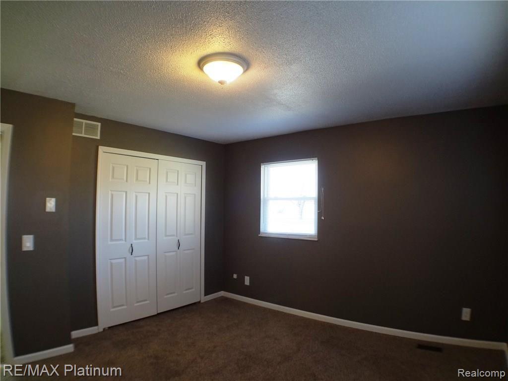 4452 Hinchey Road Howell, MI 48843 - Photo 11 of 32 Bedroom 1