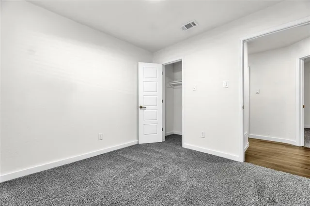 an empty room with an entryway