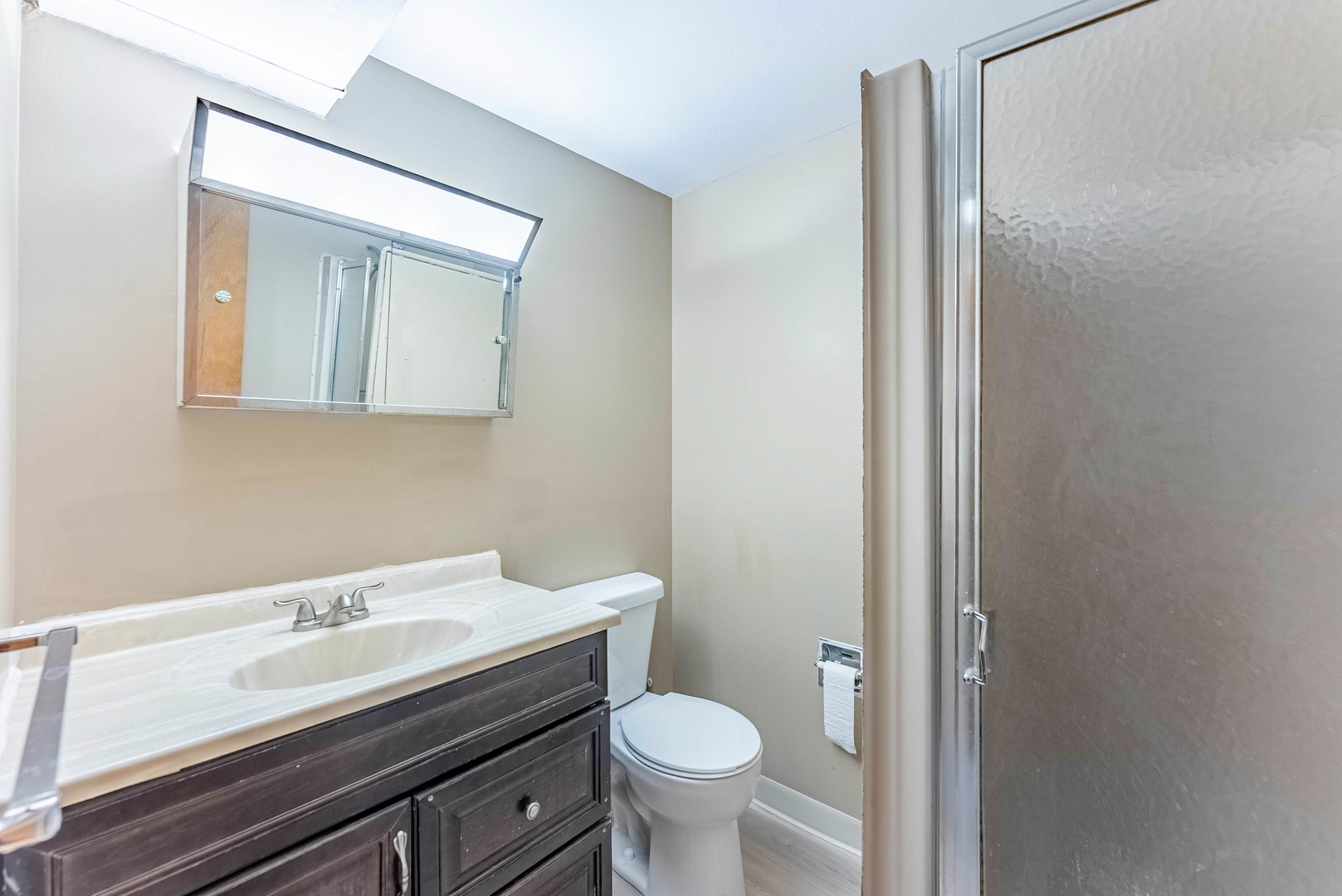 729 Yates Avenue Romeoville, IL 60446 - Photo 16 of 18 a bathroom with a sink and a toilet