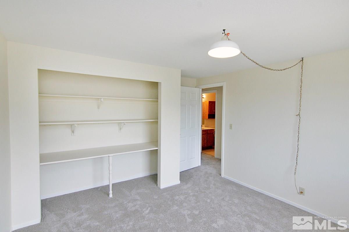 17195 Touraco Street Reno, NV 89508 - Photo 26 of 37 a view of an empty room with a closet