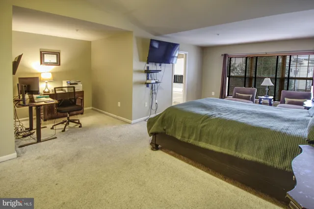 a room with furniture and mirror