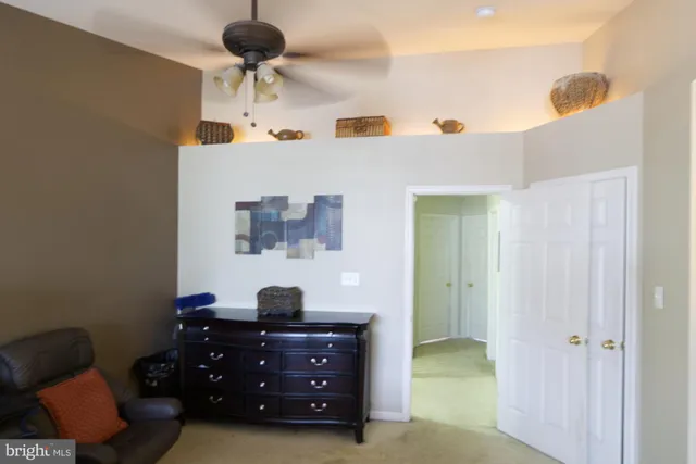 a bedroom with a bed and a cabinets