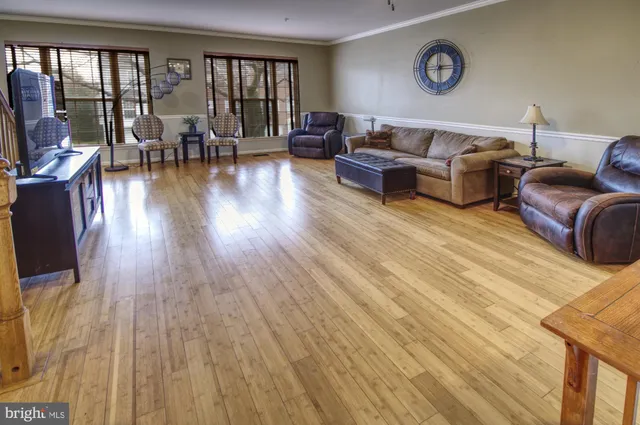 a view of balcony with wooden floor