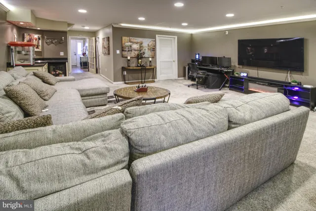 a kitchen with stainless steel appliances granite countertop a sink and a stove