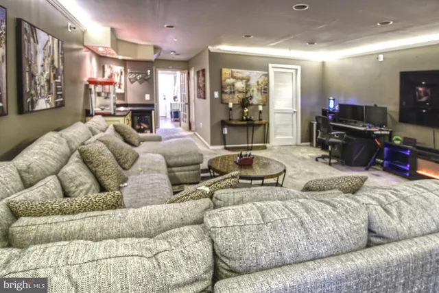 a bedroom with bed and wooden floor