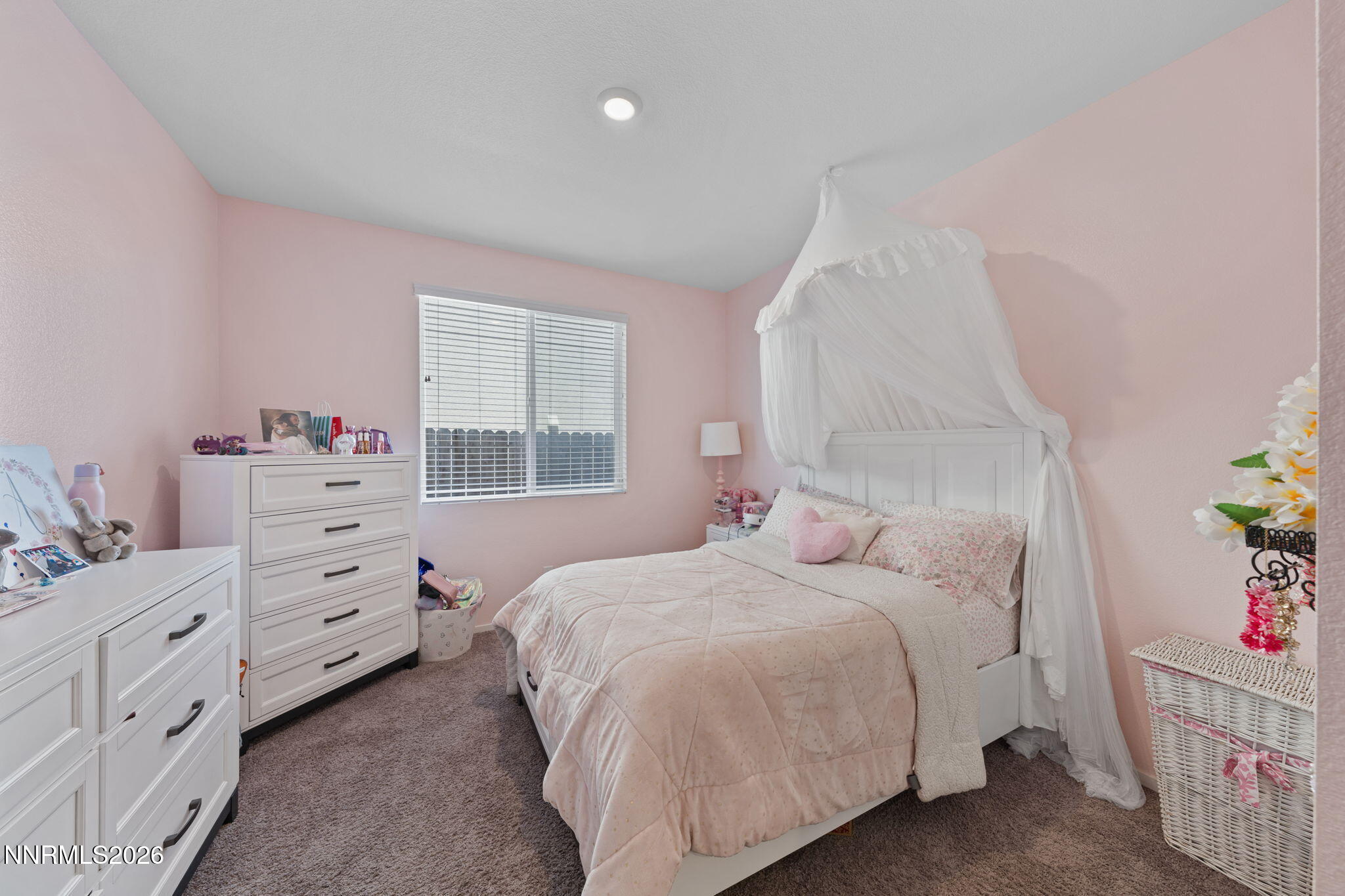 9708 Sea Glass Drive Reno, NV 89506 - Photo 13 of 51 a bedroom with a bed and a dresser