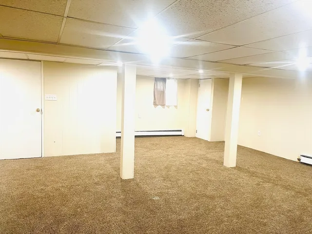 an empty room with an empty shelves