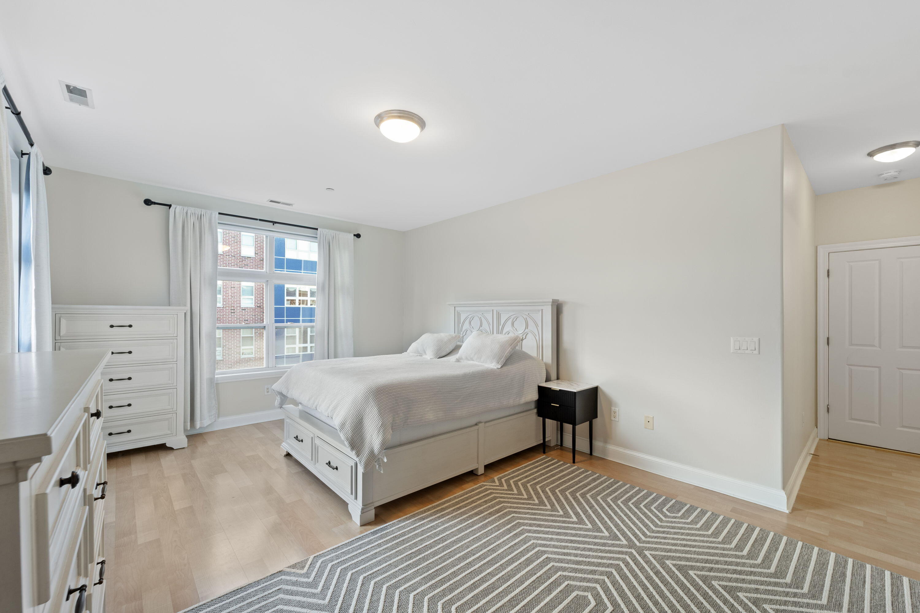 1915 North Water Street, Unit 408 Milwaukee, WI 53202 - Photo 13 of 22 Primary Bedroom